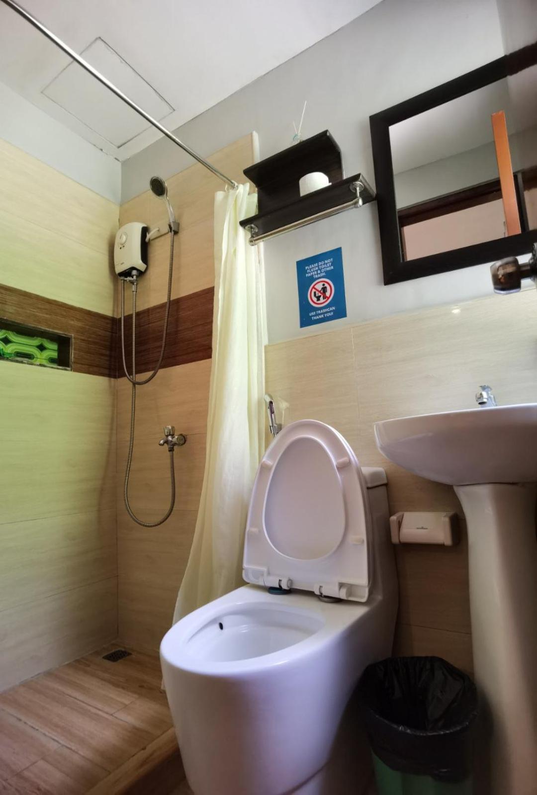 Amos Pili Tree Inn Powered By Cocotel Ель-Нідо Номер фото